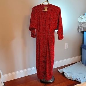 Dress by John Richard red and black with hidden buttons all the way down front.